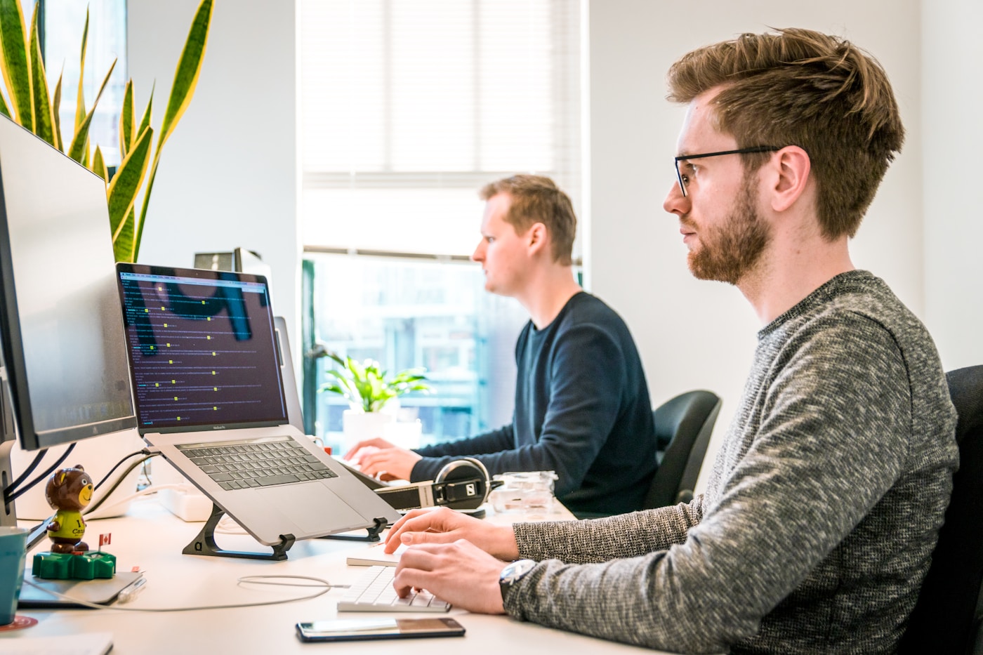 Team collaborating around connected business software